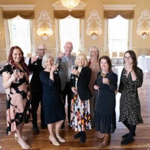 Image of eight solicitors at the Bonell and Co event in Stratford’s Town Hall