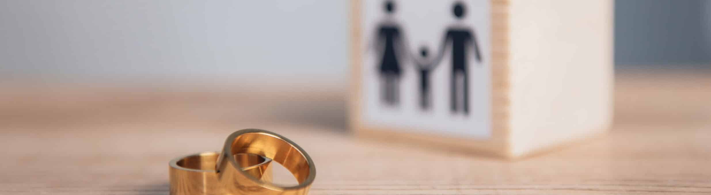 Two wedding bands left on a table