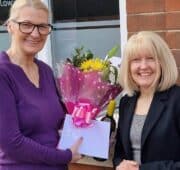 Petra receives flowers for her 45 years of service at Alsters Kelley