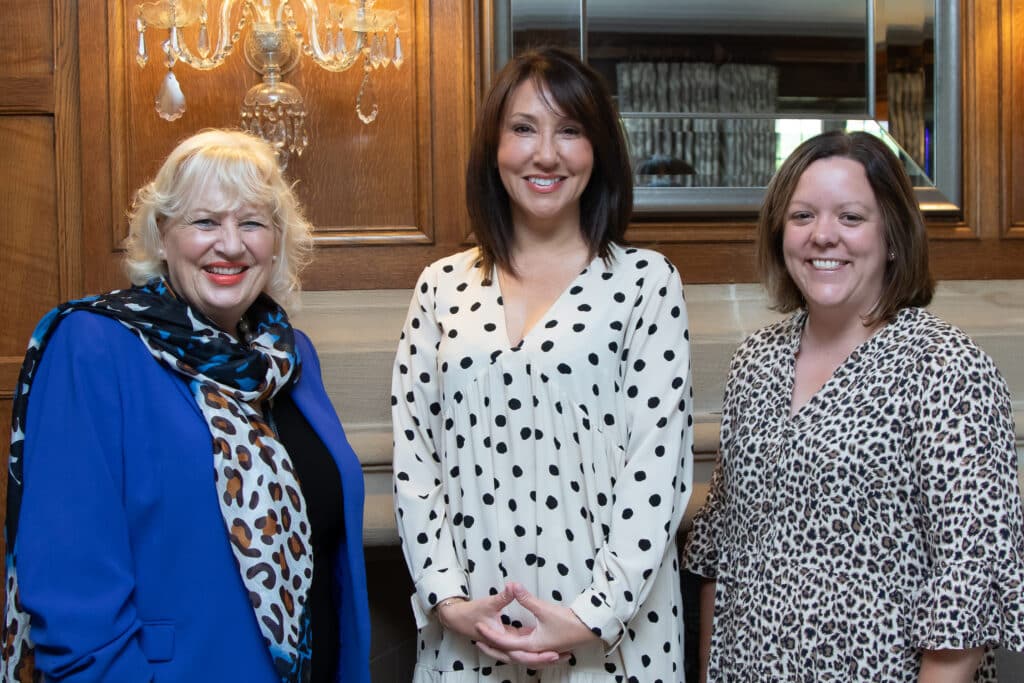 Ladies First Networking Lunch attendees smiling for a photo