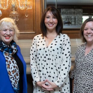 Ladies First Networking Lunch attendees smiling for a photo