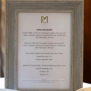 Ladies First Buffet menu with chicken, halloumi, and fish dishes