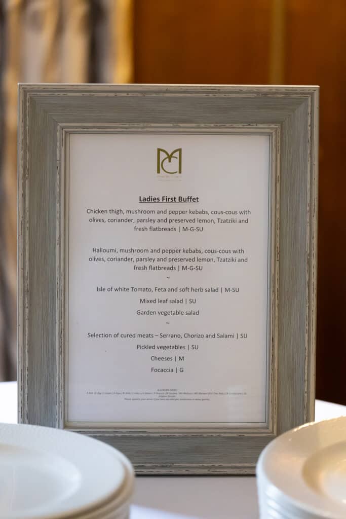 Ladies First Buffet menu with chicken, halloumi, and fish dishes