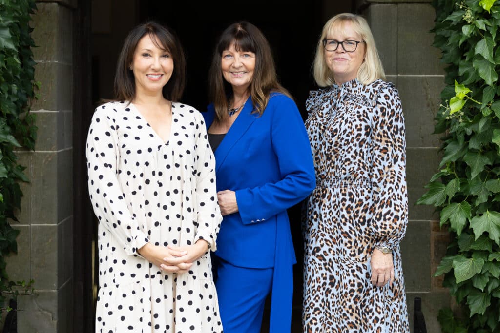 Three women at Ladies First Networking Lunch, September 2025