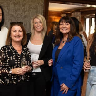 Women networking at a September 2025 Ladies First lunch event.