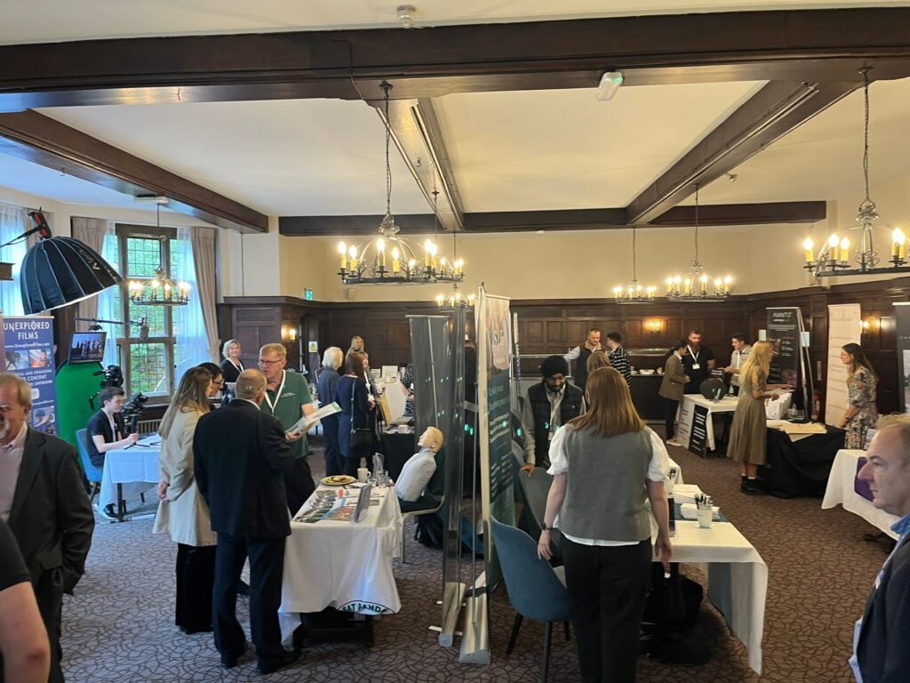 Business professionals networking at Banbury Chamber of Commerce Expo, BCOC Live