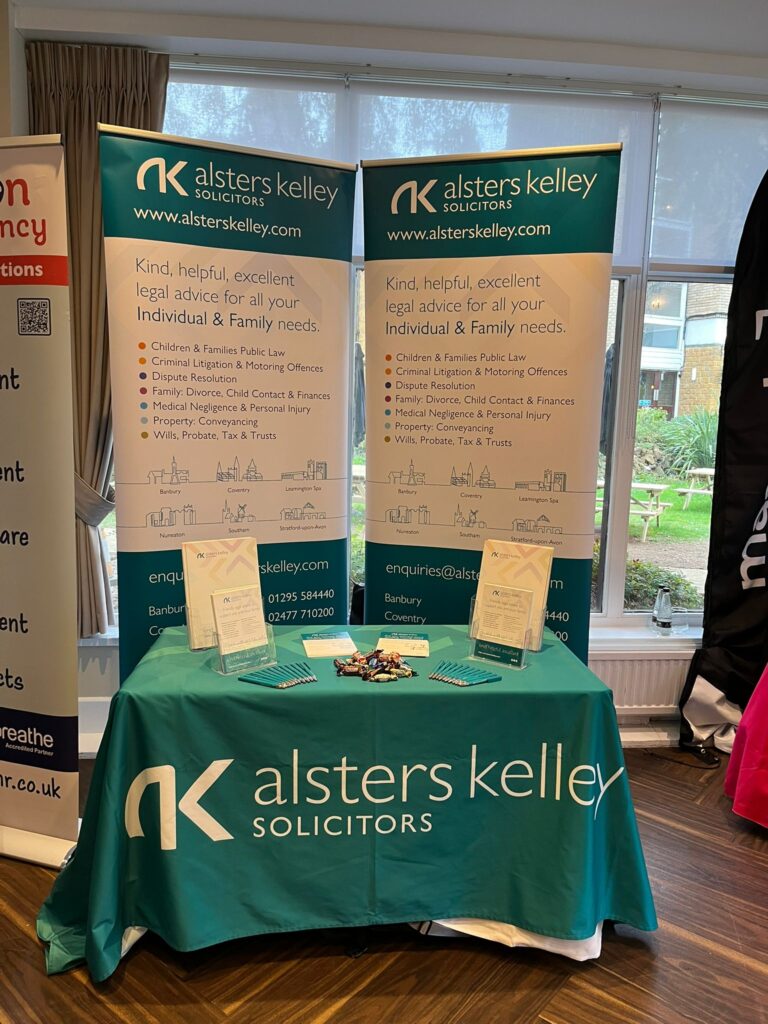 Alsters Kelley Solicitors booth at Banbury Chamber of Commerce Expo with banners and brochures