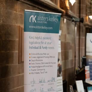 Banner for Alsters Kelley Solicitors with various legal services listed