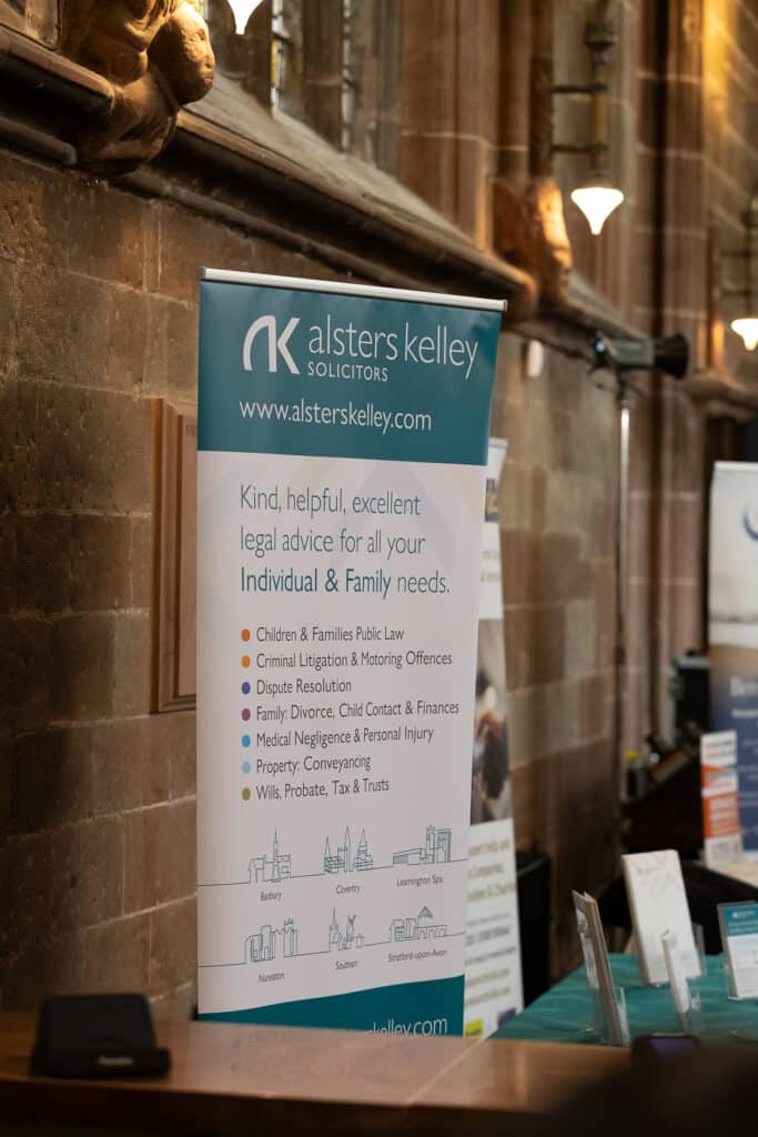 Banner for Alsters Kelley Solicitors with various legal services listed