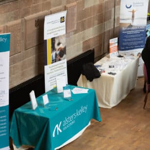Alsters Kelley solicitors stand at Ladies First Networking event, February 2026.