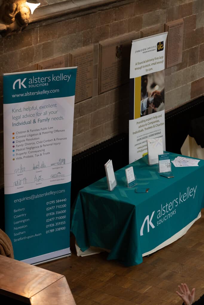 Alsters Kelley solicitors table with brochures at Ladies First Networking event