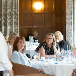 Women at the Ladies First Lunch in June 2026, seated at a table.